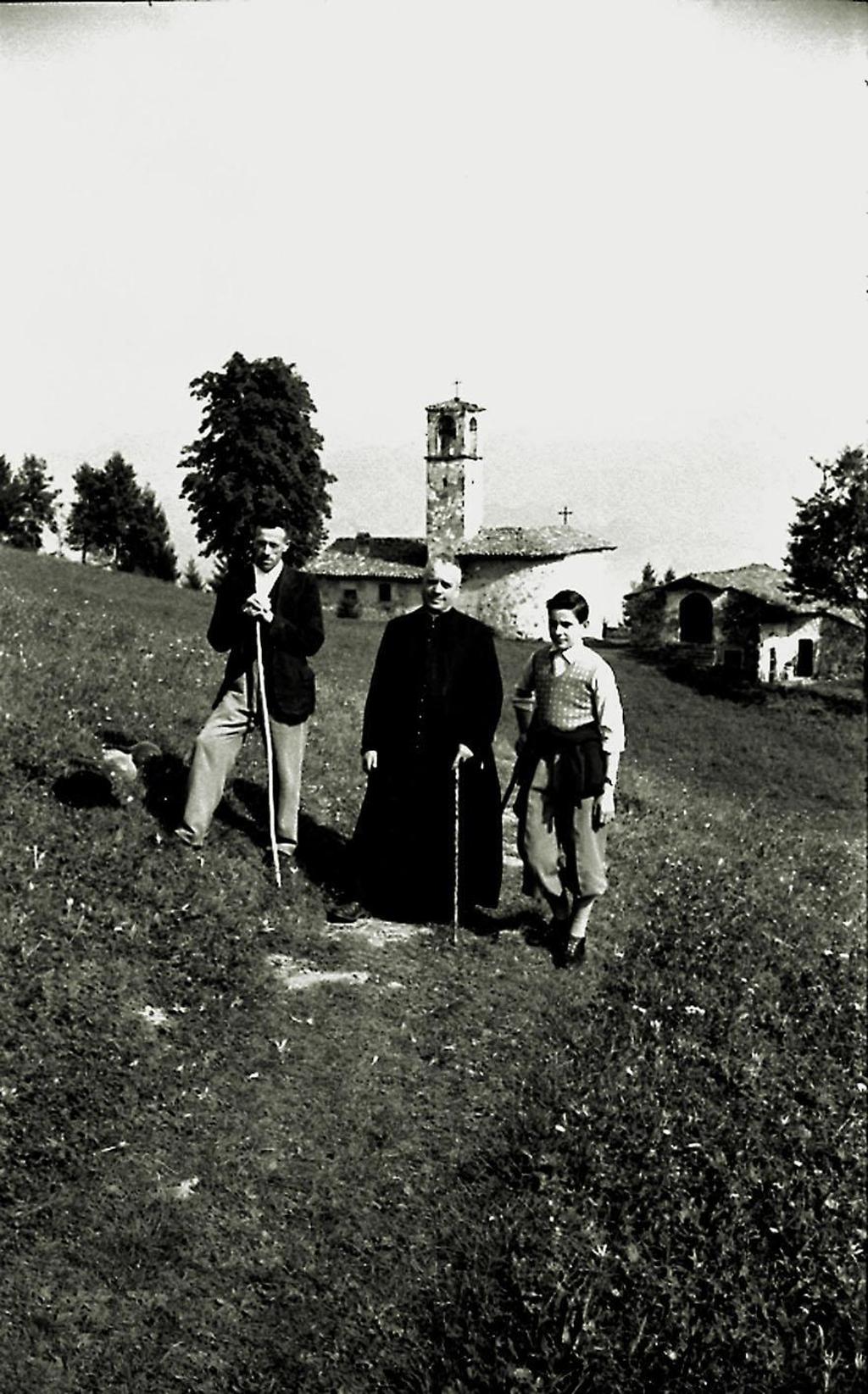 S.Lucio-Mons Spada Con Il Sagrista Moret E Il Giovane Segretario Alberto Rondi · Historify